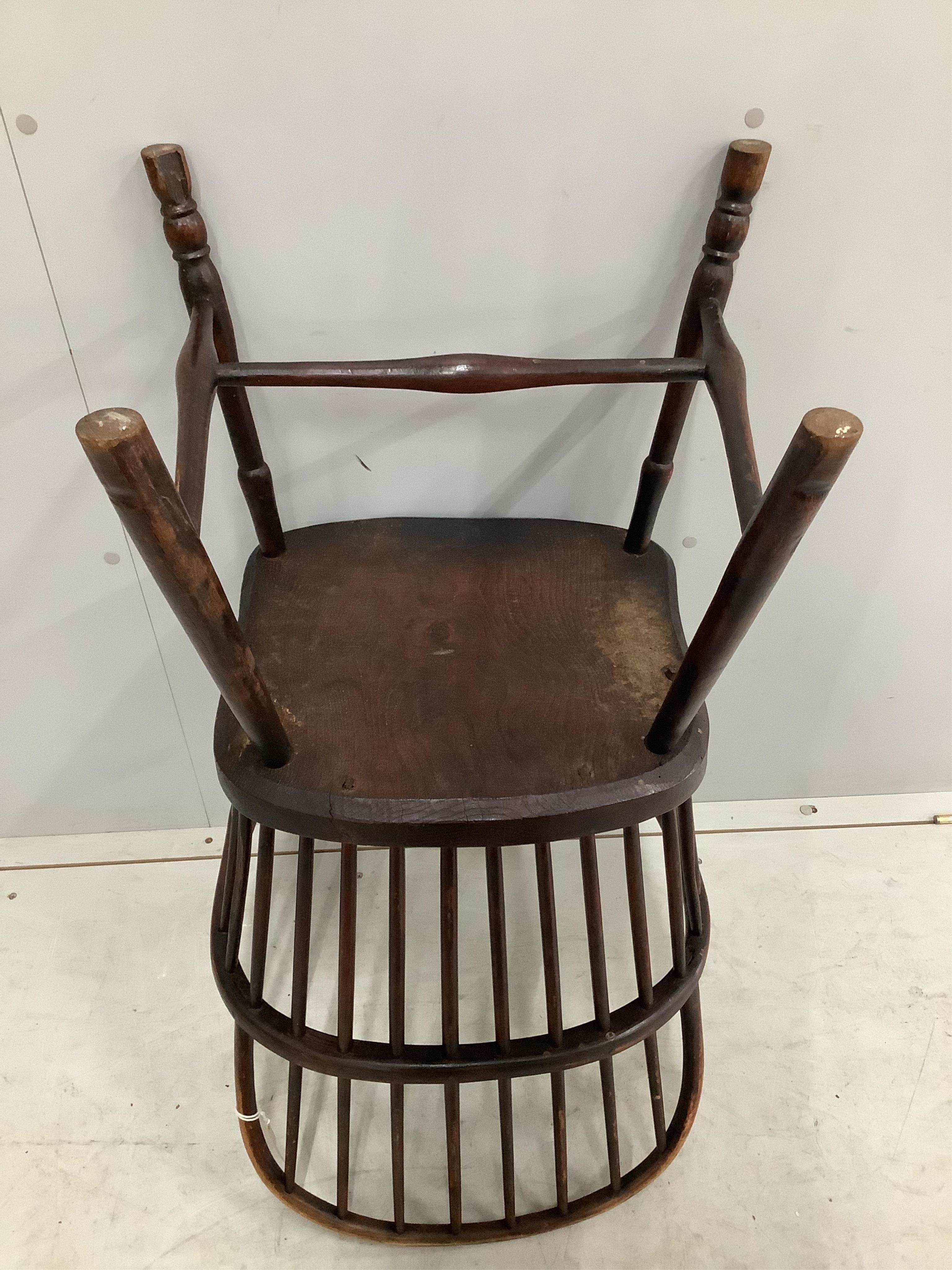 A 19th century Thames Valley elm and beech comb back Windsor elbow chair, width 49cm, depth 41cm, height 93cm. Condition - fair